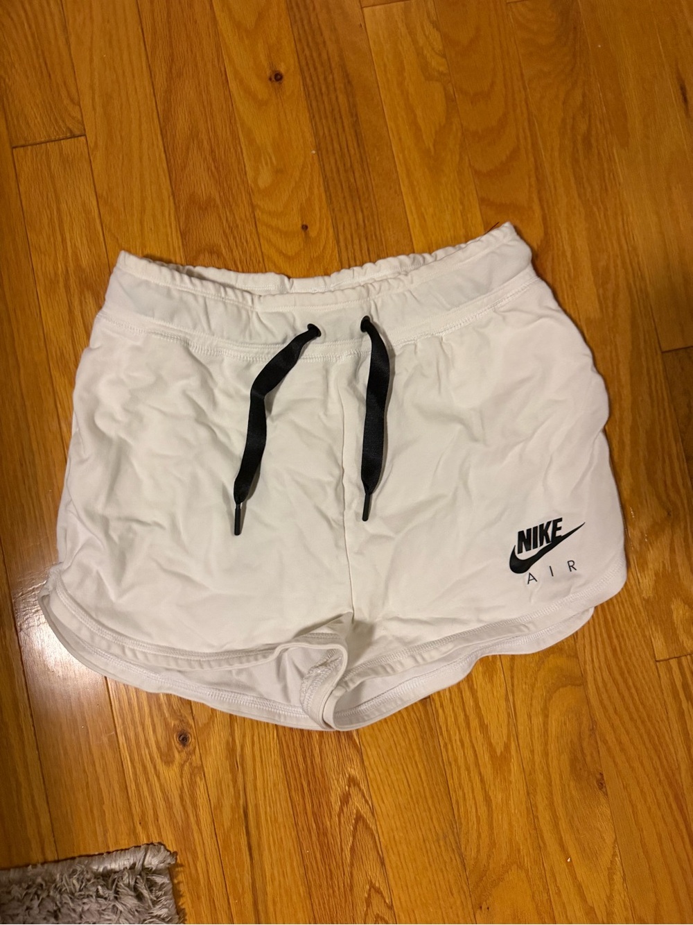 Nike Women's White Athletic Drawstring Shorts with Black Logo